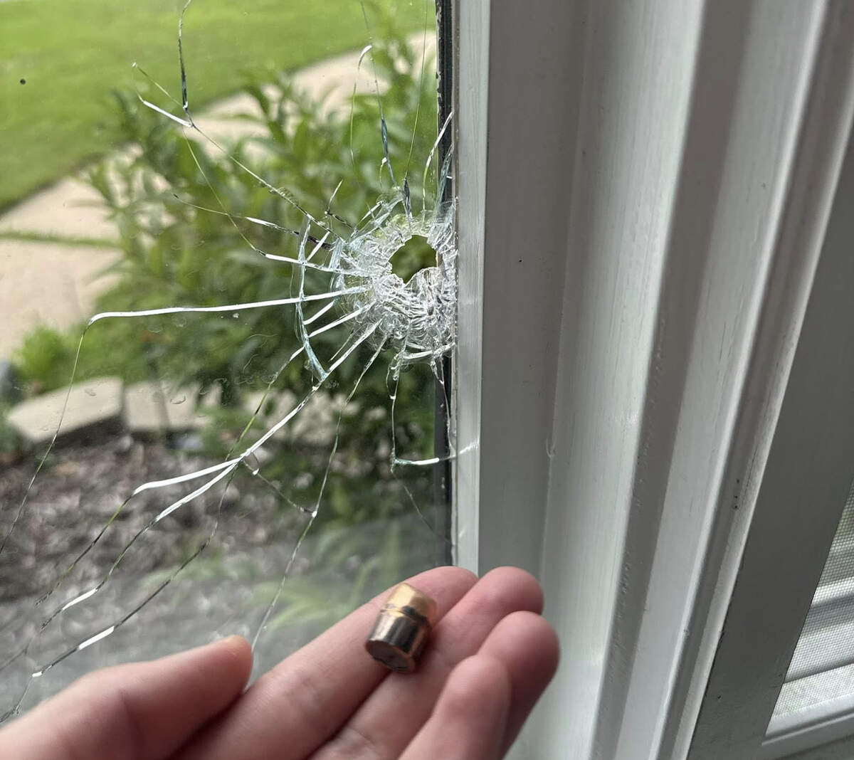Kate Fowler, who lives on East 75th Street near Troost, a short distance north of the location of a mass shooting early Saturday, said she and her husband woke up to a bullet hole in the front window of their home and a bullet that had landed on their living room floor.