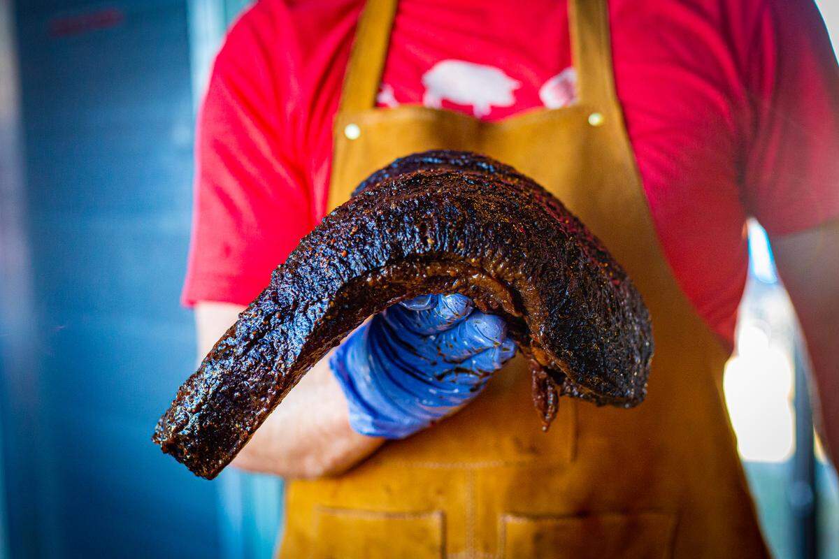 Wolfepack BBQ’s menu items include Creekstone brisket, Duroc pulled pork, Italian Sausage Co. links, thick sliced pork belly, and turkey and beer-glazed pork spare ribs.