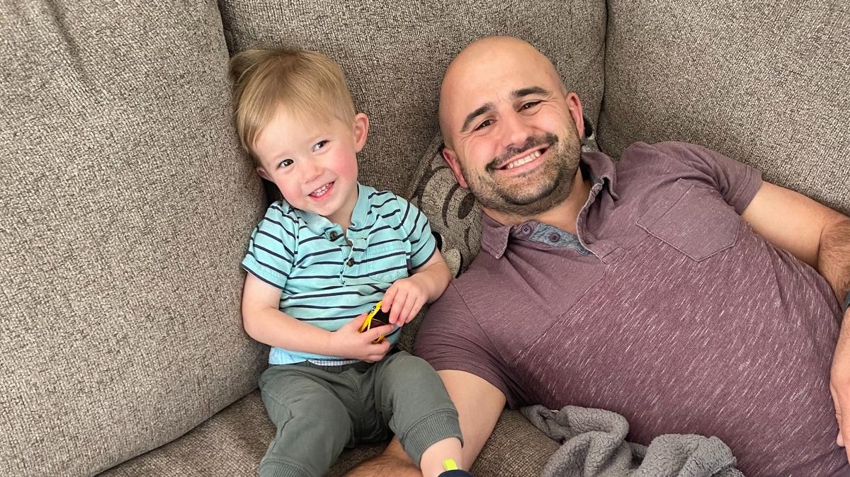 A photo of Jordan Yust and his son.