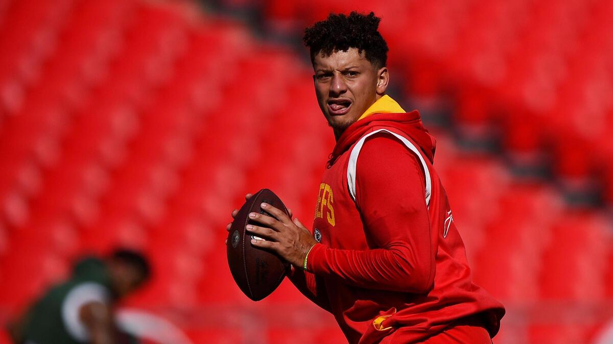 Kansas City Chiefs quarterback Patrick Mahomes warms up before the preseason game with the Green Bay Packers Thursday, August 25, 2022, at Arrowhead Stadium.