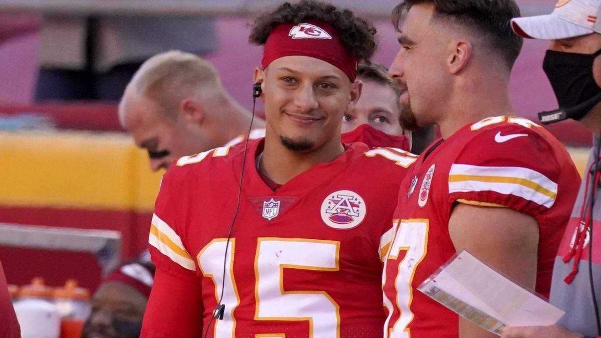 Kansas City Chiefs’ Patrick Mahomes (15) and Travis Kelce talk on the sideline late in the second half of an NFL football game against the New York Jets on Sunday, Nov. 1, 2020, in Kansas City, Mo.