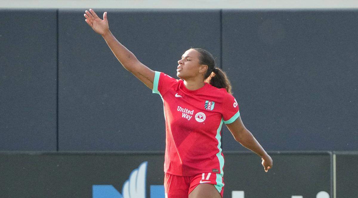 Kansas City Current forward Michelle Cooper celebrates a goal against Racing Louisville FC at CPKC Stadium.