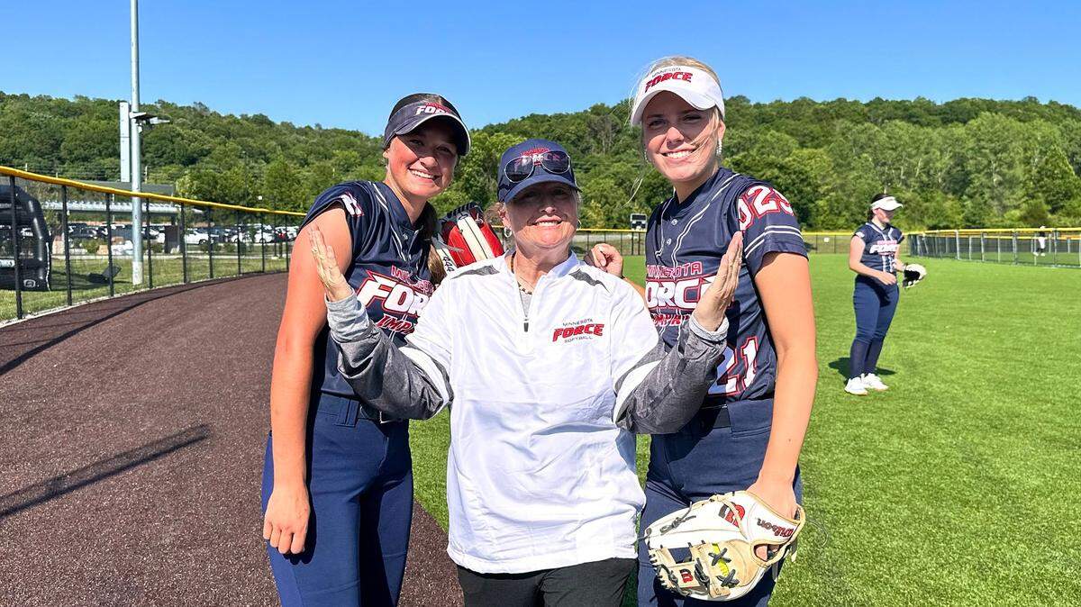Minnesota Force coach Julie Standering stands with class of 2025 pitchers Jorey Fry (right) and Carter Raymond (left) prior to their first game at Kansas City’s annual Top Gun Softball Invitational in Shawnee on June 13, 2024.