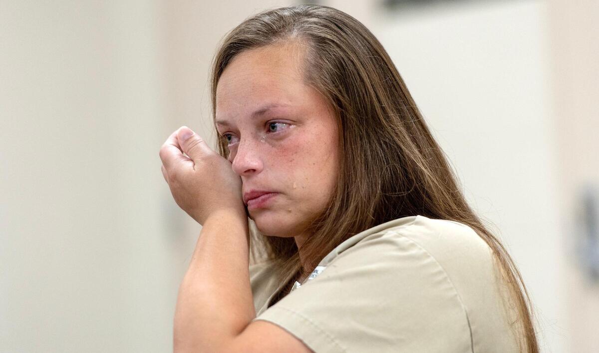 Victoria Brown cries while speaking about the four people killed in a police chase and crash in 2018. Brown was fleeing Independence police in a stolen Jeep when she struck another car across the city limits in Kansas City.