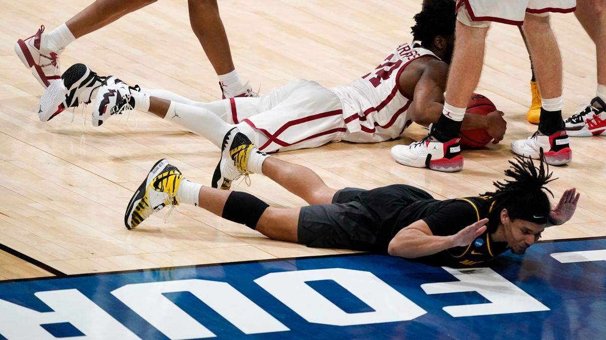 Missouri guard Drew Buggs reacts after fouling Oklahoma guard Elijah Harkless during the second half of their first-round game in the NCAA Tournament at Lucas Oil Stadium, Saturday, March 20, 2021, in Indianapolis.