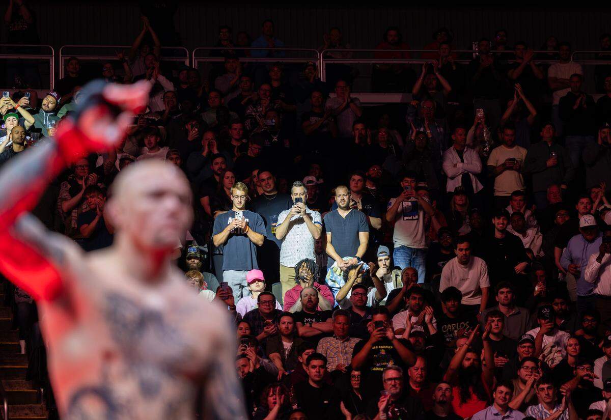 UFC veteran Anthony Smith acknowledges the crowd at the T-Mobile Center in Kansas City on Saturday night before his retirement fight during UFC Fight Night: Machado Garry vs. Prates. Smith went on to lose the fight to fellow light heavyweight Zhang Mingyang.