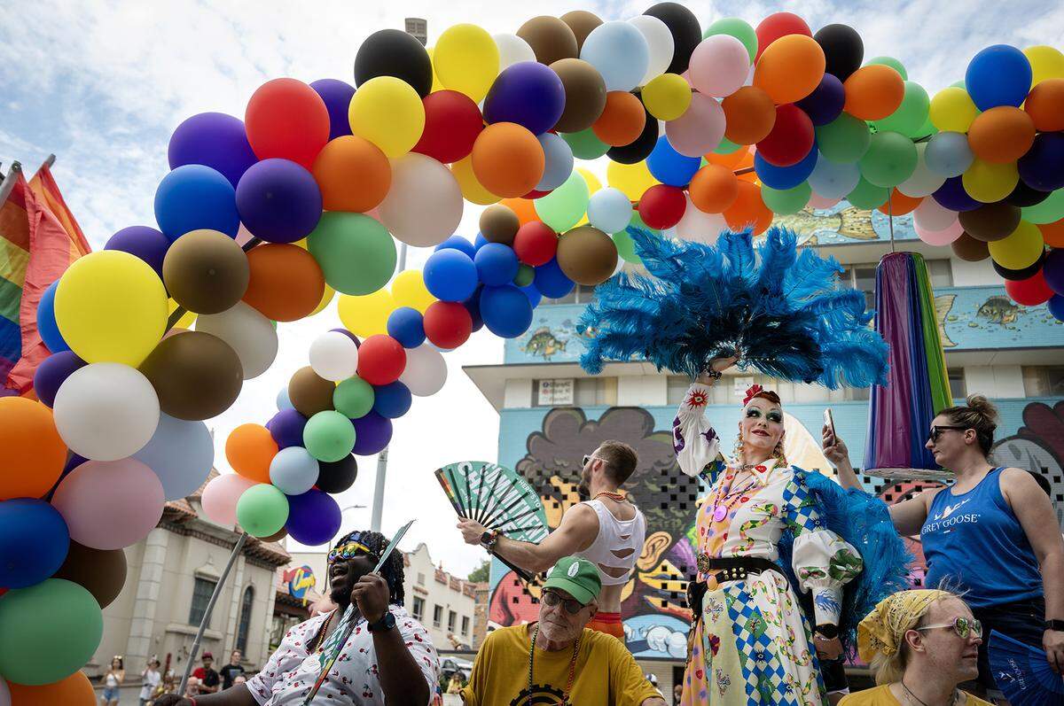 Performers from Missy B’s rode on their float during the KC Pride Parade in 2024.