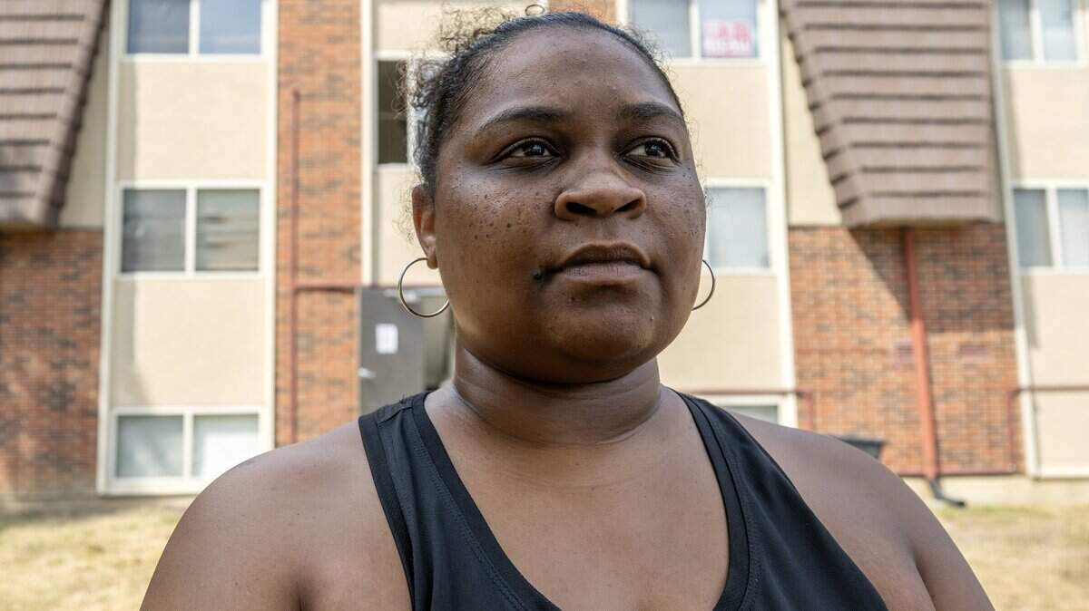 Mikayla Daniels stands for a portrait outside her apartment building at Sage Crossing Apartments on Wednesday, Sept. 17, 2025, in Lee's Summit.