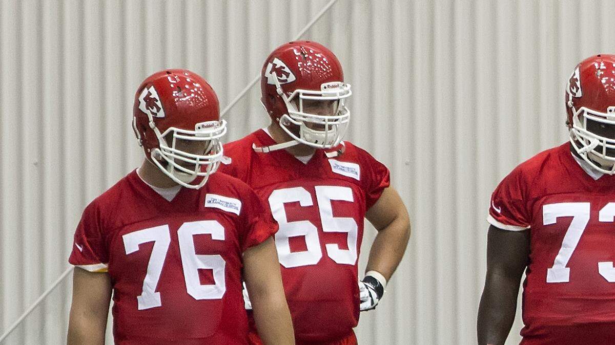 Chiefs offensive linemen Laurent Duvernay-Tardif (76) and Zach Fulton (73) listened to instructions Saturday on the first day of Chiefs rookie minicamp at the Arrowhead practice facility.