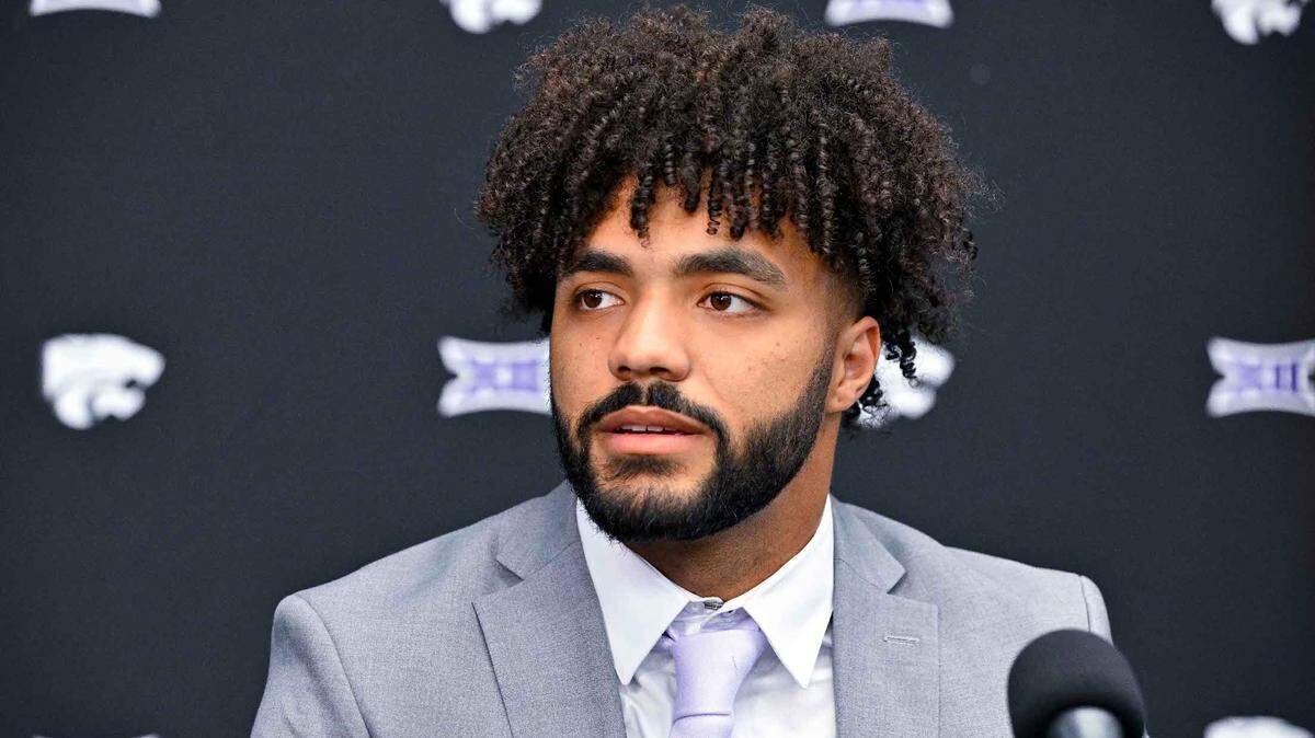 Kansas State Wildcats safety Kobe Savage is interviewed during Big 12 football media days at AT&T Stadium in Arlington, Texas, on July 13, 2023.