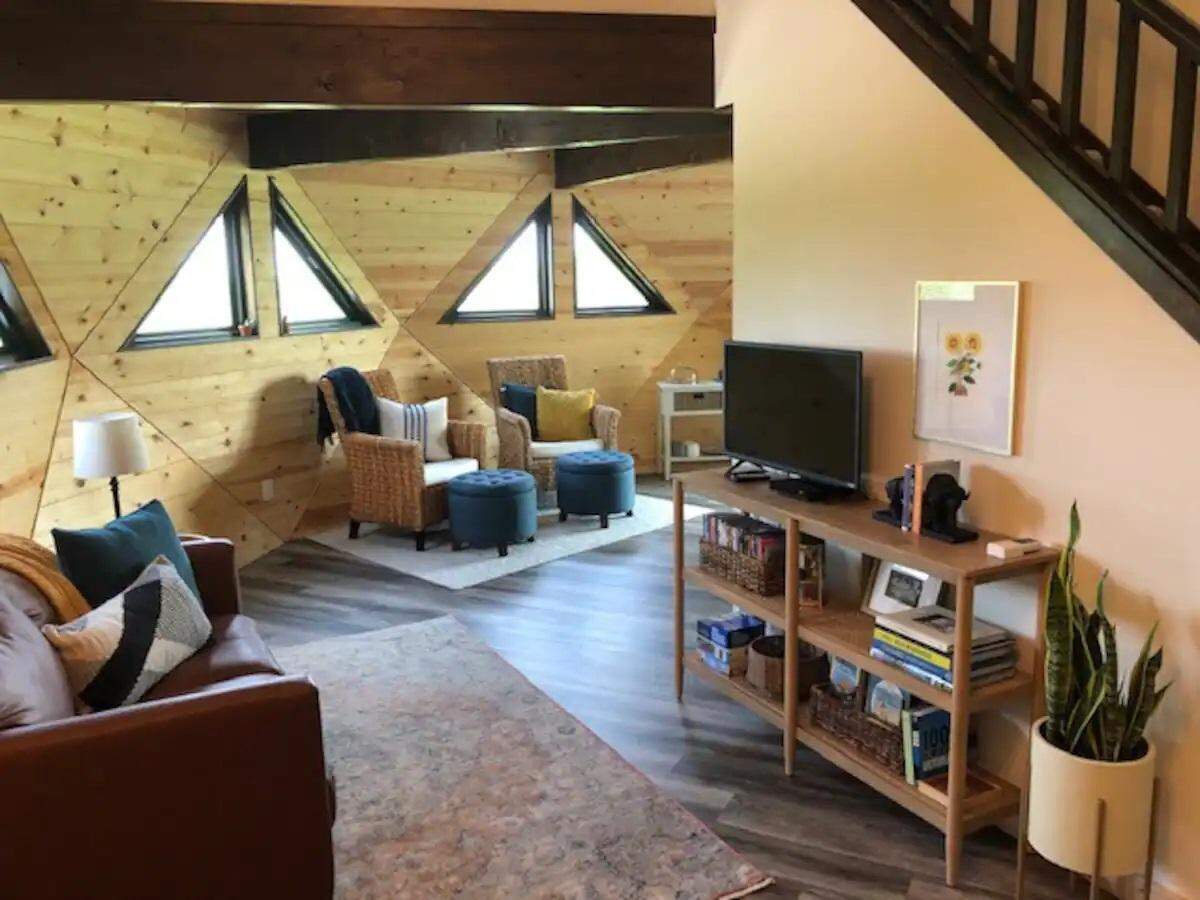 Relax in a curved living room at this 10-sided rental unit in Baileyville, Kansas.