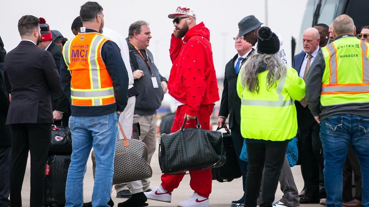 Kansas City Chiefs tight end Travis Kelce prepares to board a chartered United flight on their way to Las Vegas for Super Bowl LVIII on Sunday February 4, 2024 at KCI Airport in Kansas City, Missouri.