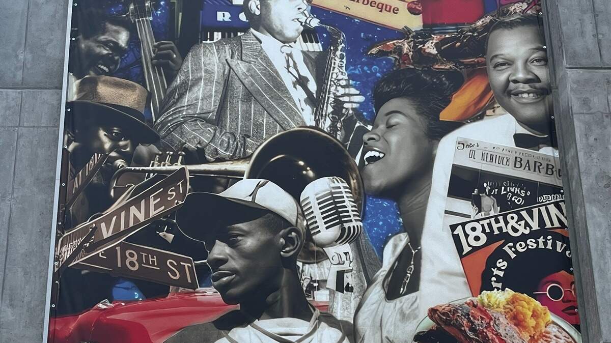 Kansas City artist Michael Tombs was chosen to design a poster showing the history of the Historic 18th and Vine Jazz District. His art will hang on the Lydia Garage on 18th Street through the FIFA World Cup, and a permanent installation is selected.