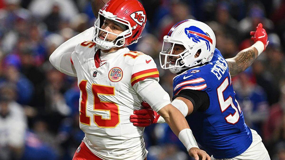 ORCHARD PARK, NEW YORK - NOVEMBER 02: Patrick Mahomes #15 of the Kansas City Chiefs looks to pass as A.J. Epenesa #57 of the Buffalo Bills defends during the fourth quarter in the game at Highmark Stadium on November 02, 2025 in Orchard Park, New York. (Photo by Jason Miller/Getty Images)