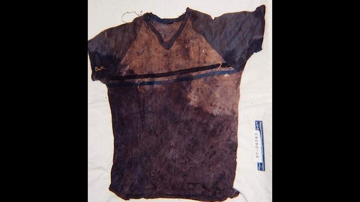 Human remains, along with jewelry and clothes, found in a roll of carpet in Michigan have been identified after 28 years, officials said.