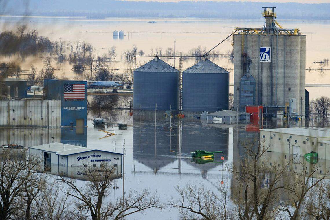 Floodwaters surrounded buildings near Hamburg, Iowa, on Sunday.