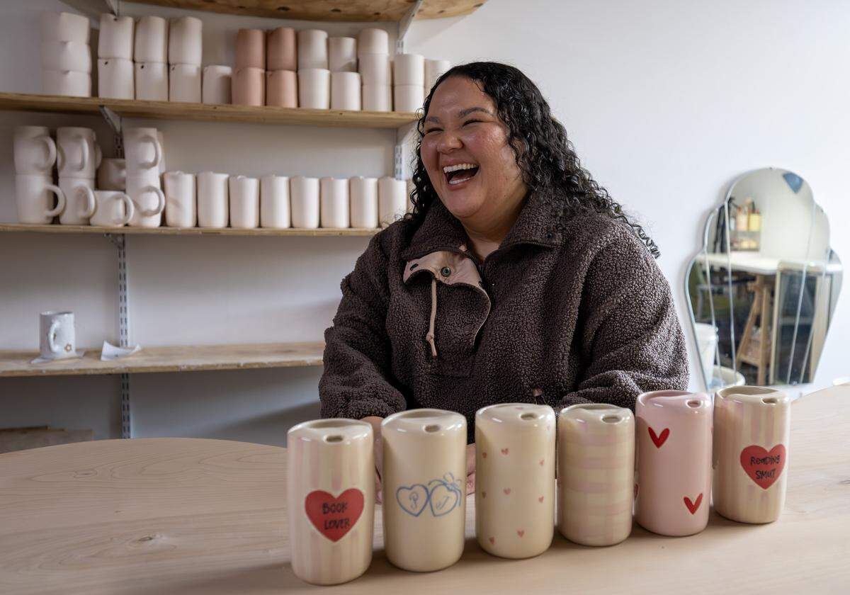 Priscilla Butler, owner of Lila's Clayground, laughs as she is pictured inside her studio Thursday, Jan. 29, 2026, in Kansas City.