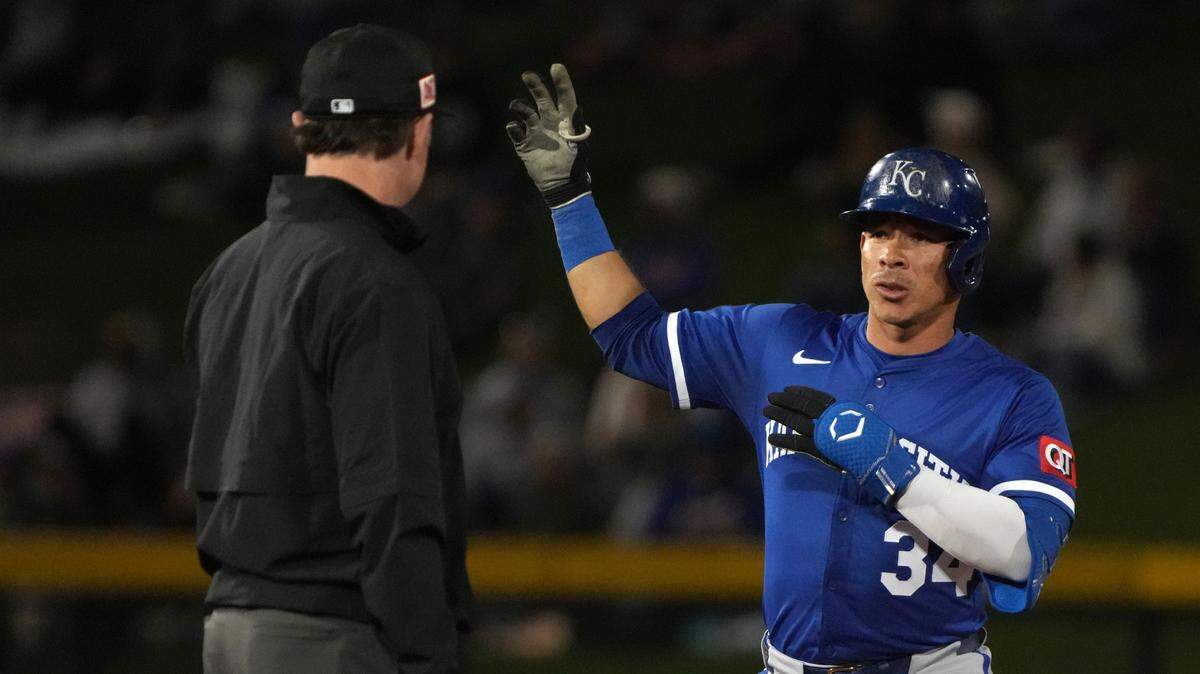 Kansas City Royals catcher Freddy Fermin (34) celebrates his RBI double against the Chicago Cubs in the third inning at Sloan Park.