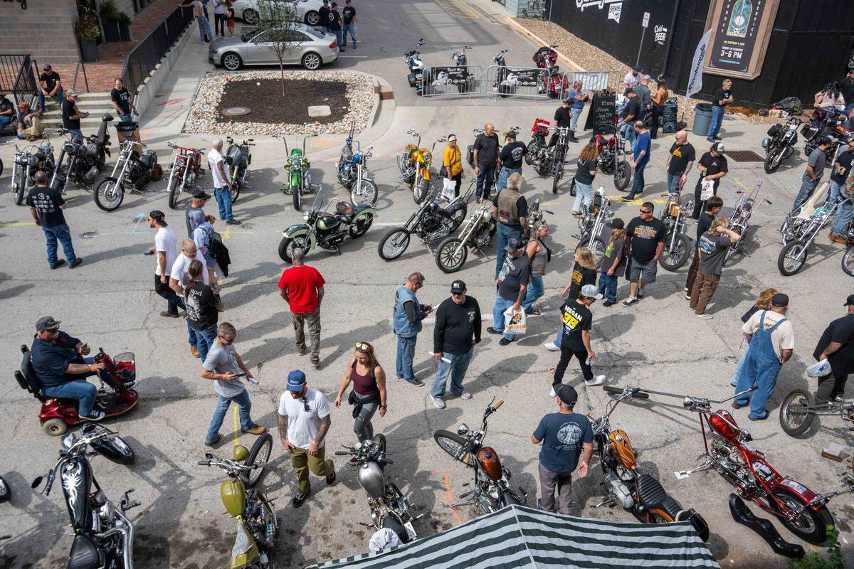 Custom motorcycles lined the streets of the West Bottoms during an event honoring David Mann, a Kansas City-born artist who influenced the creation of choppers through his artwork representing the counterculture.