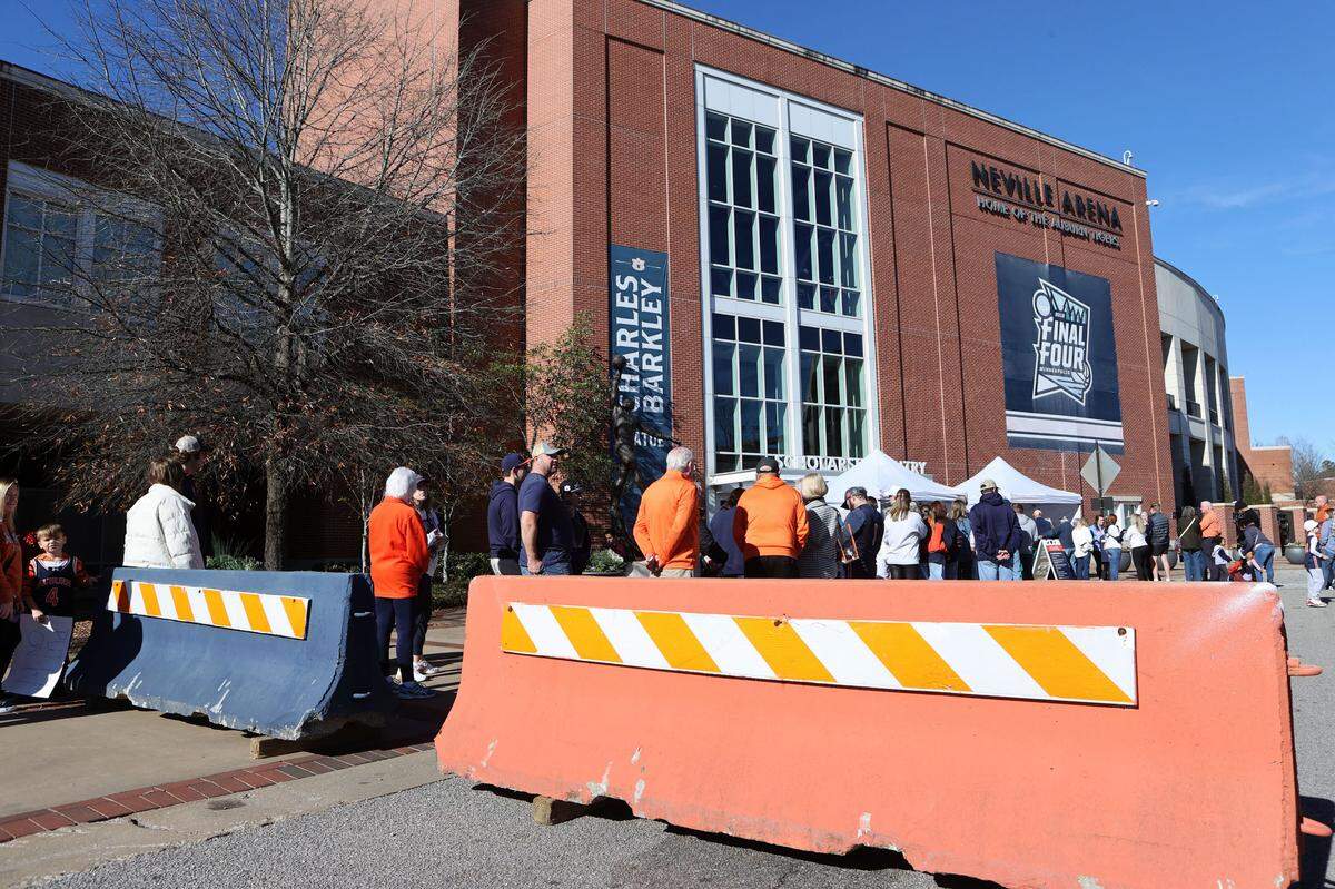Fans line up behind newly installed barricades before the Saturday, Jan 4, 2025 men’s basketball game between the Auburn Tigers and Missouri Tigers at Neville Arena in Auburn, Alabama.
