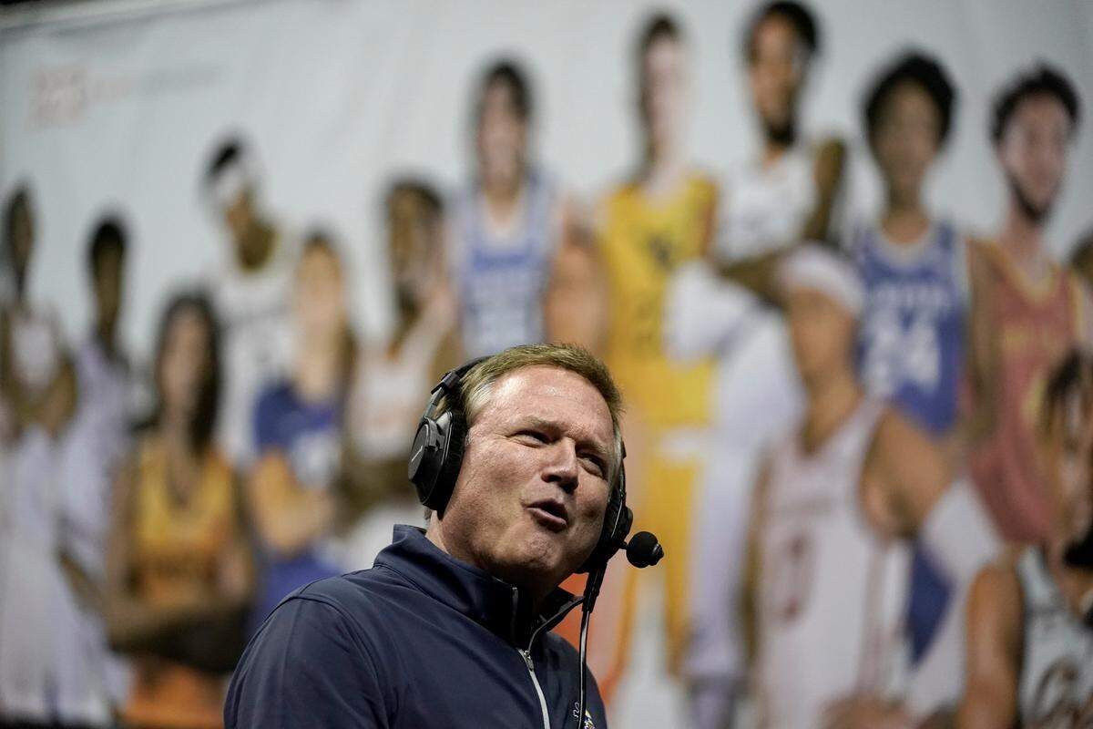 Kansas coach Bill Self does an interview during Big 12 media day Wednesday in Kansas City.