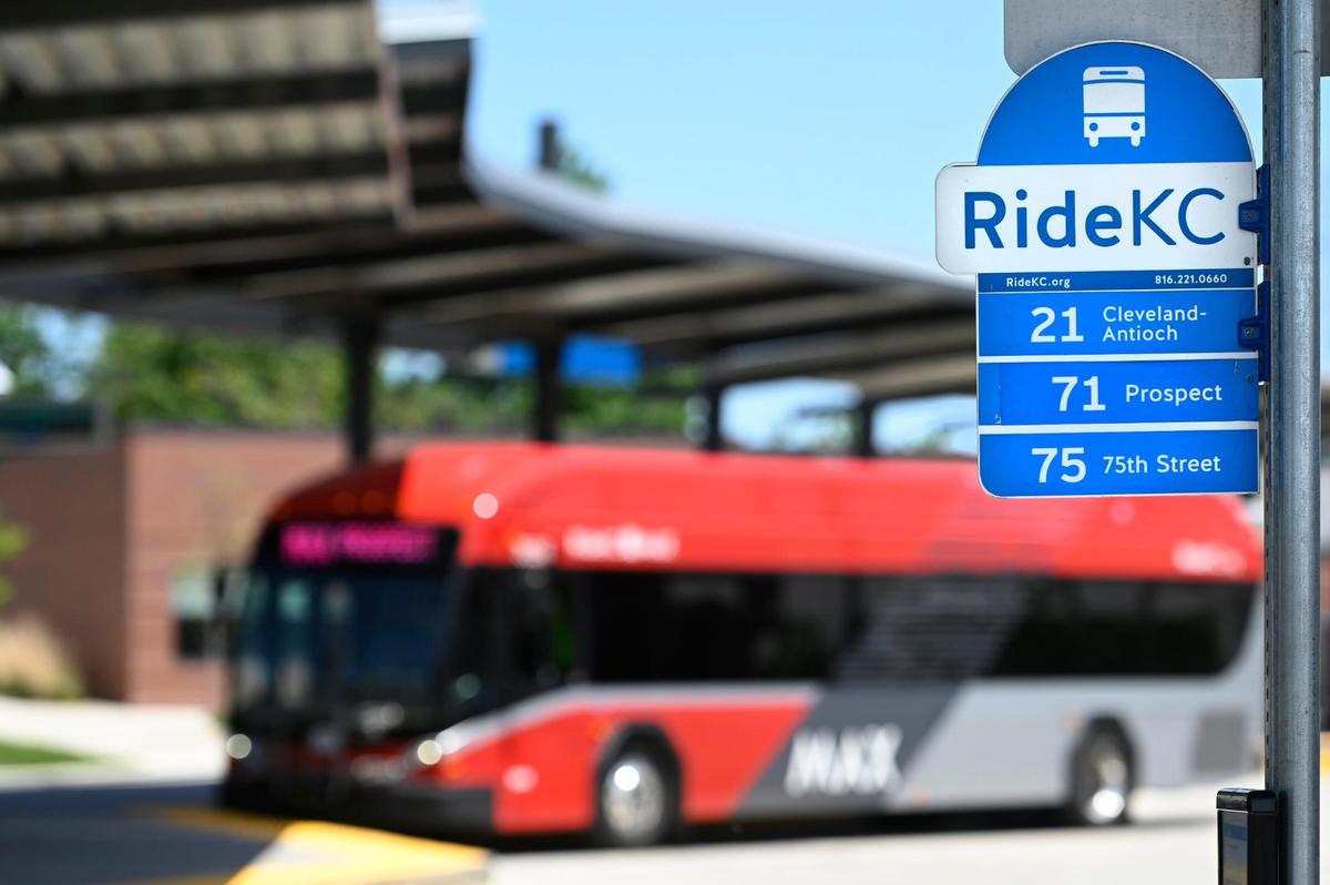 Bus route numbers are noted on a RideKC sign at the Transit Center, 7501 Prospect Ave., in Kansas City. The transit site is near the campus of Alphapointe, a center for the visually impaired.