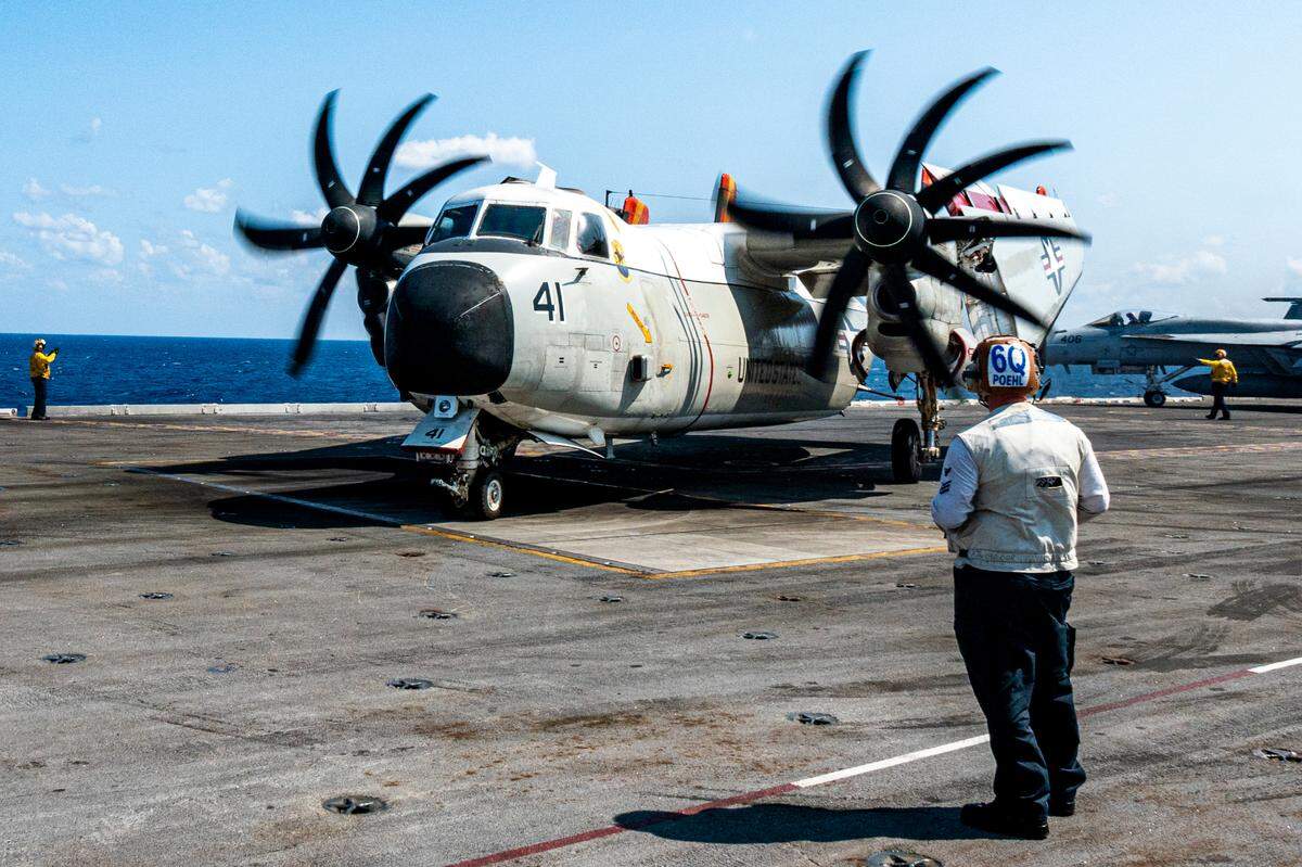 A C-2A Greyhound, used, among other ways, to transport passengers aboard the deck of the USS Harry S. Truman.