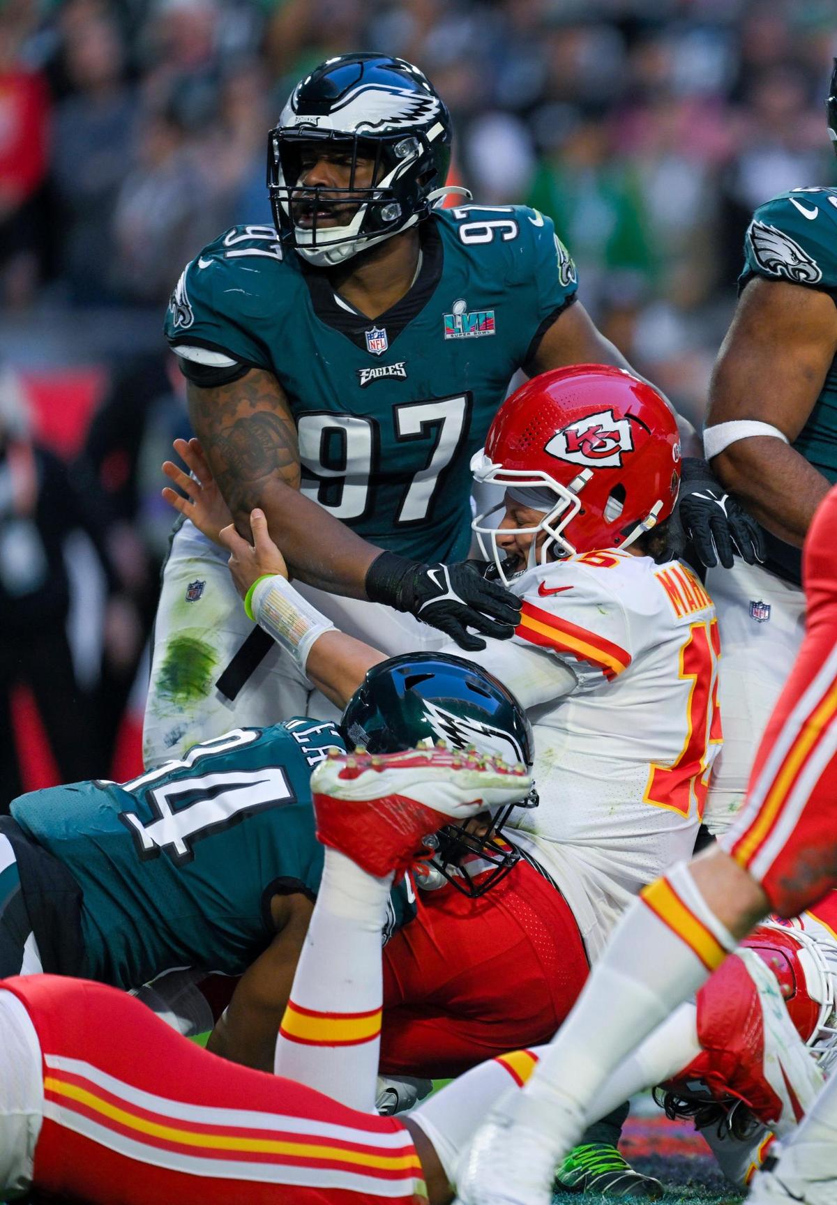 Kansas City Chiefs quarterback Patrick Mahomes (15) was crunched during the first half of Super Bowl LVII between the Kansas City Chiefs and the Philadelphia Eagles on Sunday, Feb. 12, 2023, at State Farm Stadium in Glendale, Arizona.