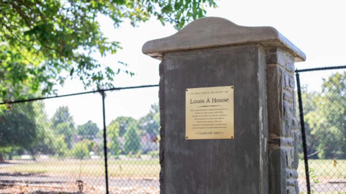 A monument honors Louis A. House, who coached at Southwest from 1925 to 1955. Members of the class of 1967 rededicated the monument in 2023. The stones that make up the monument are from the original White House.