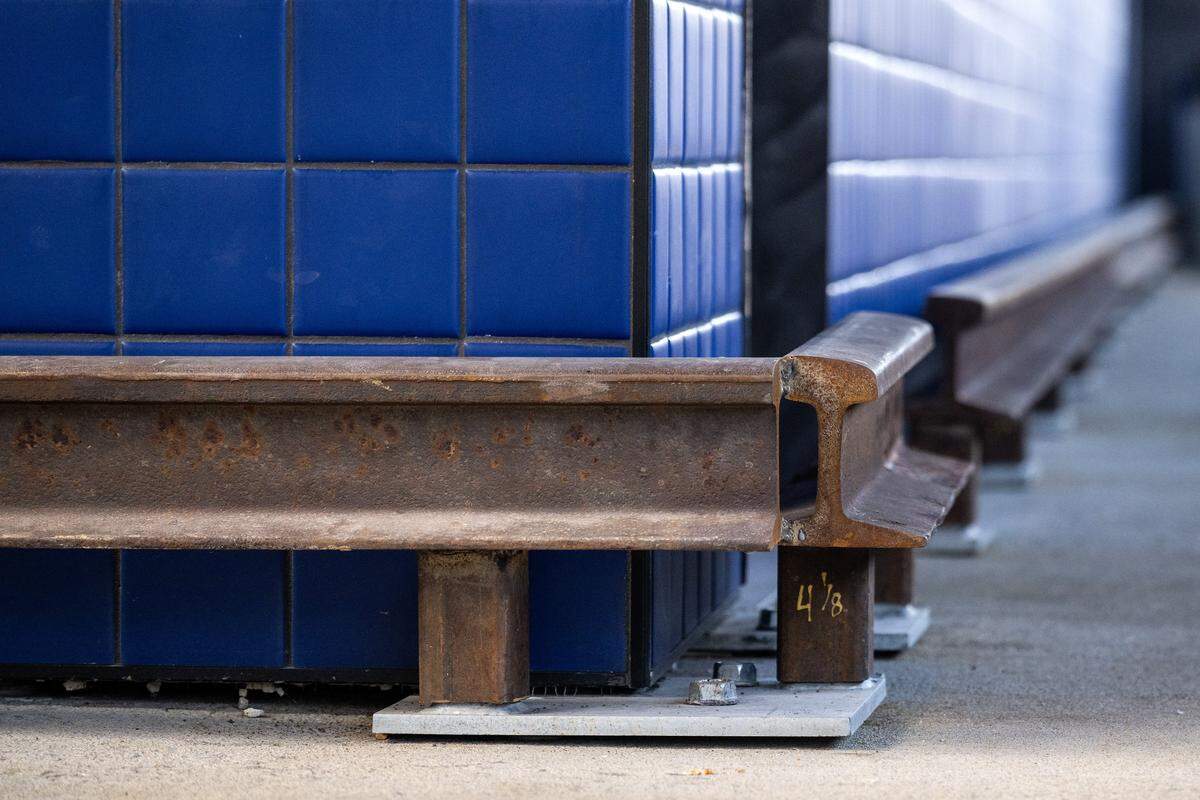 Repurposed train tracks serve as footrests near the Royal bar at Rock Island Bridge on Wednesday, March 25, 2026, in Kansas City.