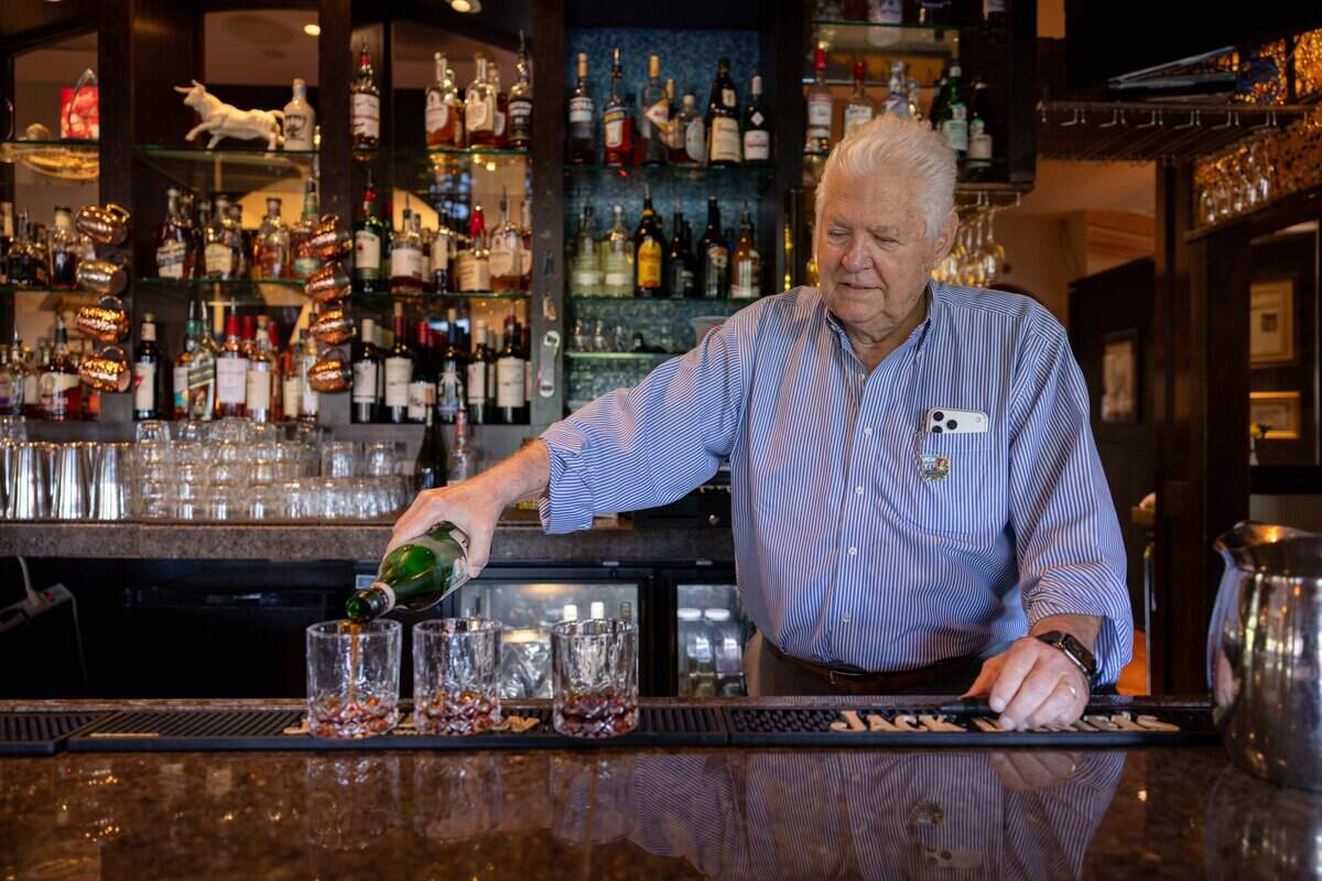 Owner Gary Worden makes three Fernet con Coca, Argentina's unofficial national cocktail at Piropos on Tuesday, June 2, 2026. A Fernet con Coca is made by combining the Italian amaro Fernet with Coca-Cola over ice.