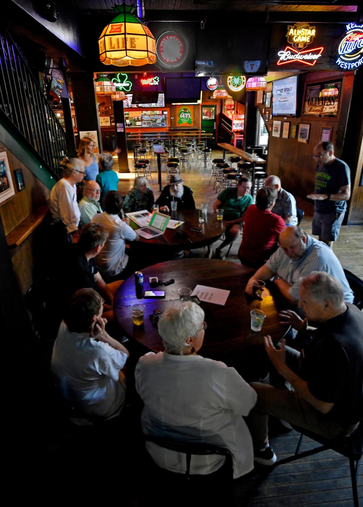 A “Squirrel” reunion, organized by longtime member Mike Messick, was convened on a recent Thursday evening. Kyle Kelly, standing right, stopped by to chat with customers who’ve been coming to Kelly’s for decades. 
