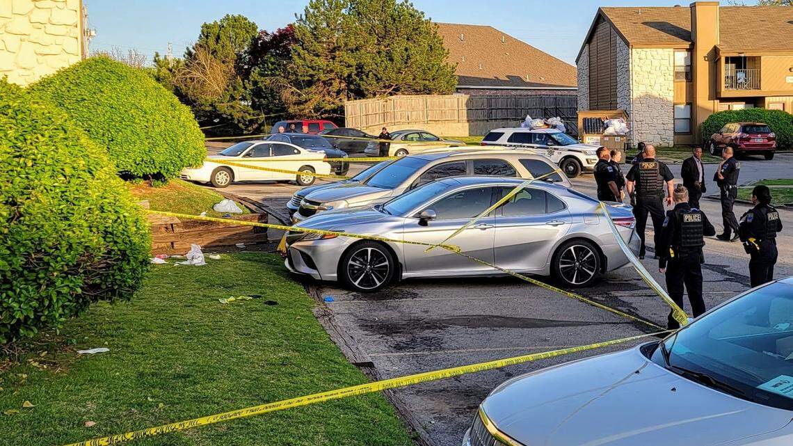 A naked man with a rifle in Tulsa killed a woman who approached him Monday night before being shot dead by police, Oklahoma officials say.