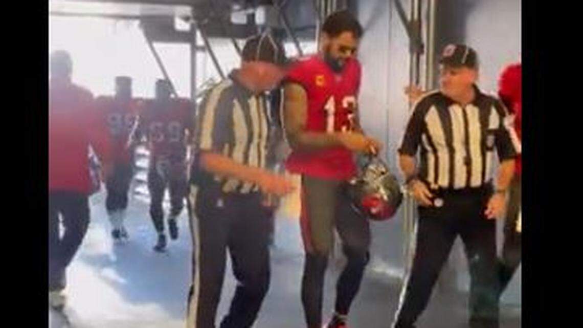 It appeared a game official asked Bucs player for an autograph after Sunday’s game