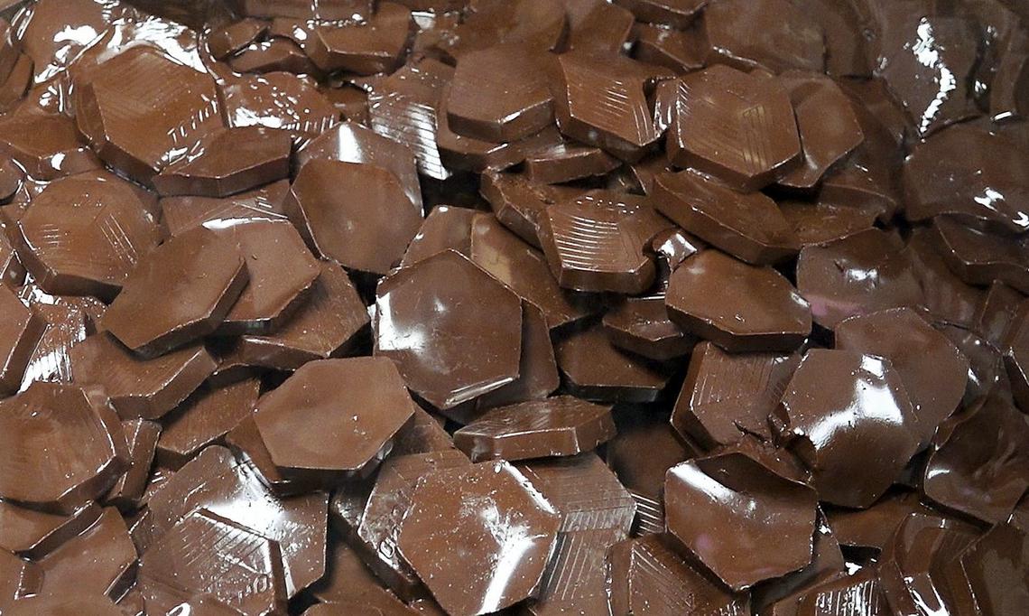 Chocolate awaits processing in a machine at Kansas City’s Clovr, which will be the first in Missouri to manufacture cannabis-infused products.