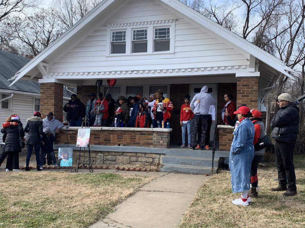 Family and friends of Cameron Lamb, 26, gathered at the home where he was shot and killed by a Kansas City police detective.
