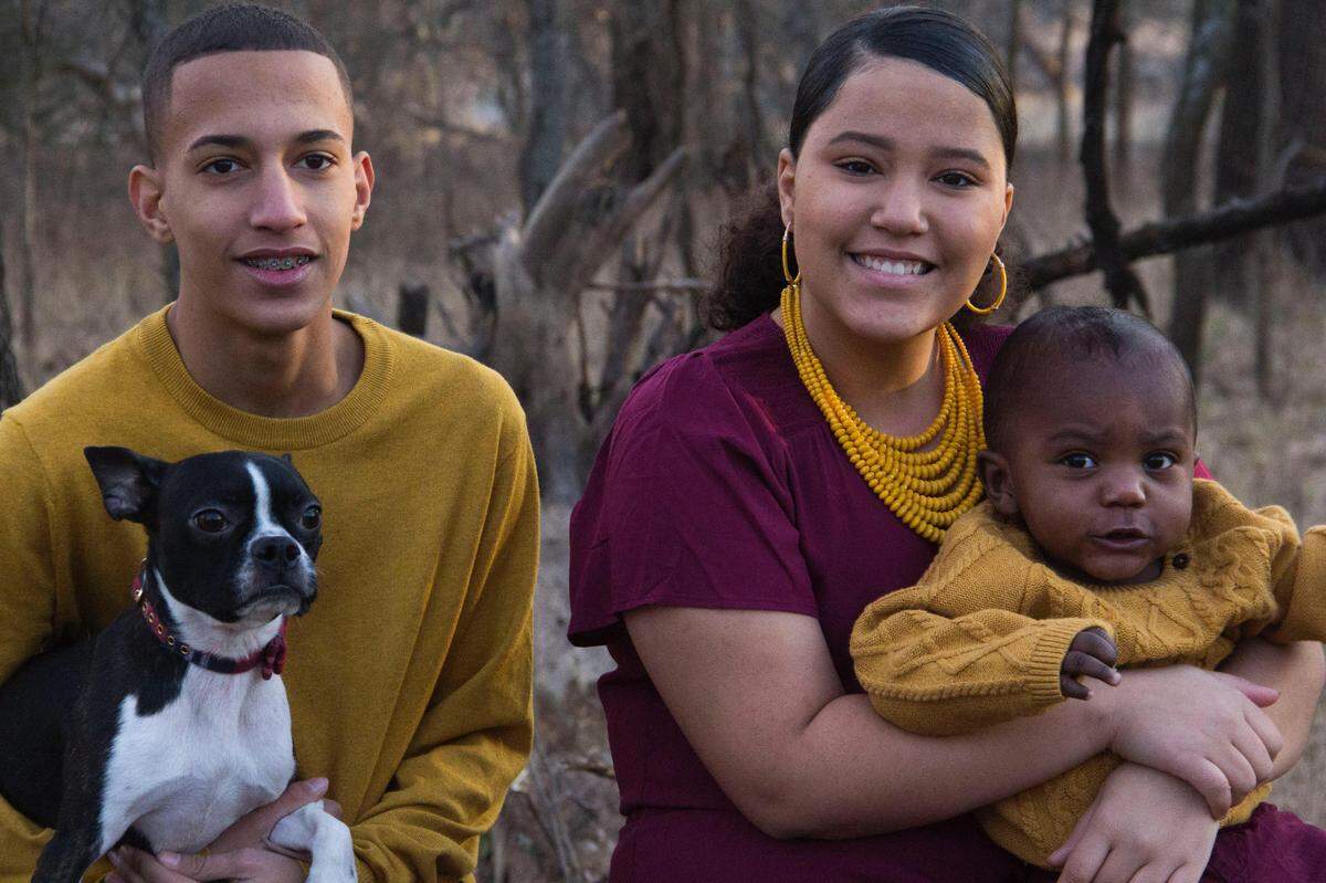 Elijaah Boston with his sister and nephew
