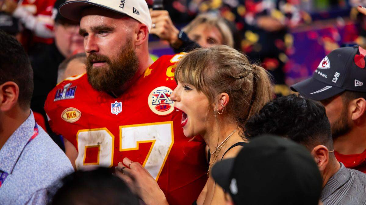 Kansas City Chiefs tight end Travis Kelce (87) celebrates with girlfriend Taylor Swift after defeating the San Francisco 49ers in Super Bowl LVIII at Allegiant Stadium.