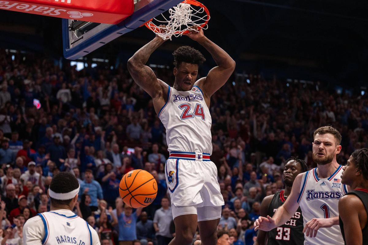Kansas Jayhawks forward KJ Adams catches an alley-oop from guard Dajuan Harris Jr. in the second half of the game vs. the Texas Tech Red Raiders on Saturday, Mar. 1, 2025, at Allen Fieldhouse.