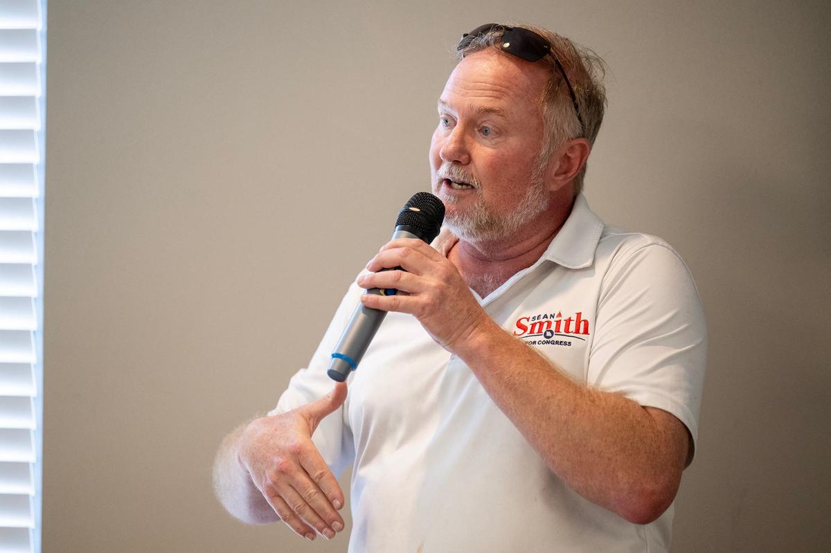 Sean Smith, a Republican candidate for U.S. Congress in Missouri’s 5th District, speaks to members of the Jackson County Republican Party about the attempted assassination of former President Donald Trump. He spoke during a GOP ice cream social in Kansas City on Sunday, July 14, 2024.