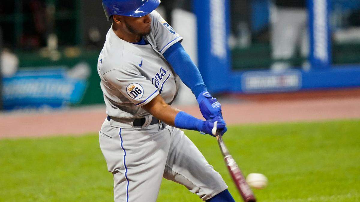Kansas City Royals’ Edward Olivares hits a single in the fifth inning of a baseball game against the Cleveland Indians, Monday, Sept. 7, 2020, in Cleveland. (AP Photo/Tony Dejak)