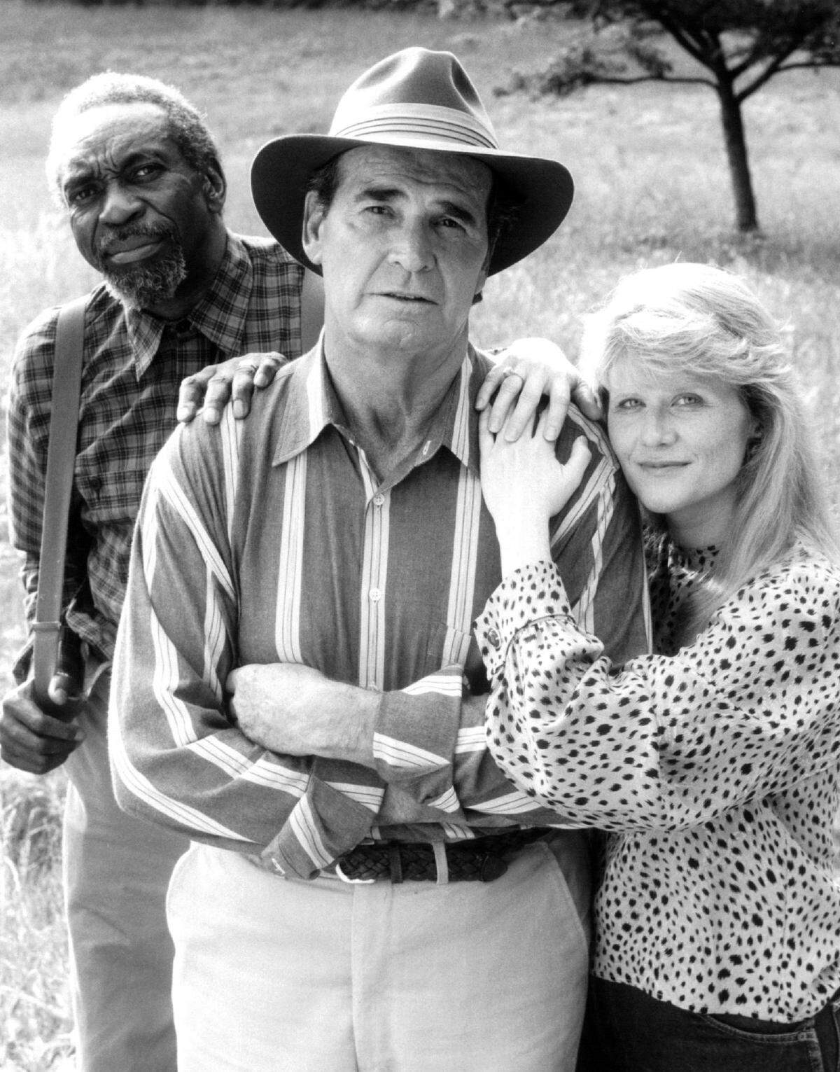 “Decoration Day” is a Hallmark Hall of Fame presentation that aired on NBC Sunday, December 2, 1990. The film stars James Garner as Albert Sidney Finch, a retired Southern judge who has grown disillusioned with life after his wife’s death. When he is asked to help a black World War II veteran (Bill Cobbs) claim his Congressional Medal of Honor, Albert reluctantly agrees. With the support of Rowena (Ruby Dee) and a determined legal advocate (Judith Ivey), Albert is helped to rediscover his purpose, confronting his own past and learning the value of friendship, love, and justice. In photo above Bill Cobbs, left, James Garner, center, and Judith Ivey.