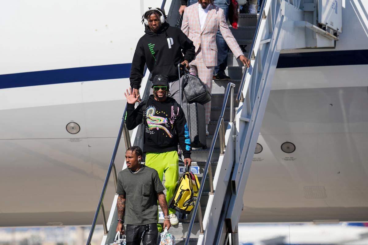 Kansas City Chiefs players arrive ahead of Super Bowl 57, Sunday, Feb. 5, 2023, in Phoenix. The Kansas City Chiefs will play the Philadelphia Eagles on Sunday.