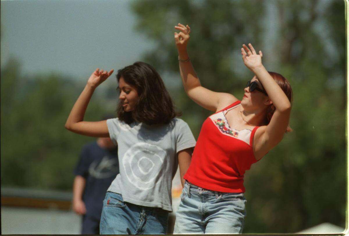 Two 15-year-olds danced while the band Day Sleeper played in 1997 at the Spirit Festival at Penn Valley Park.