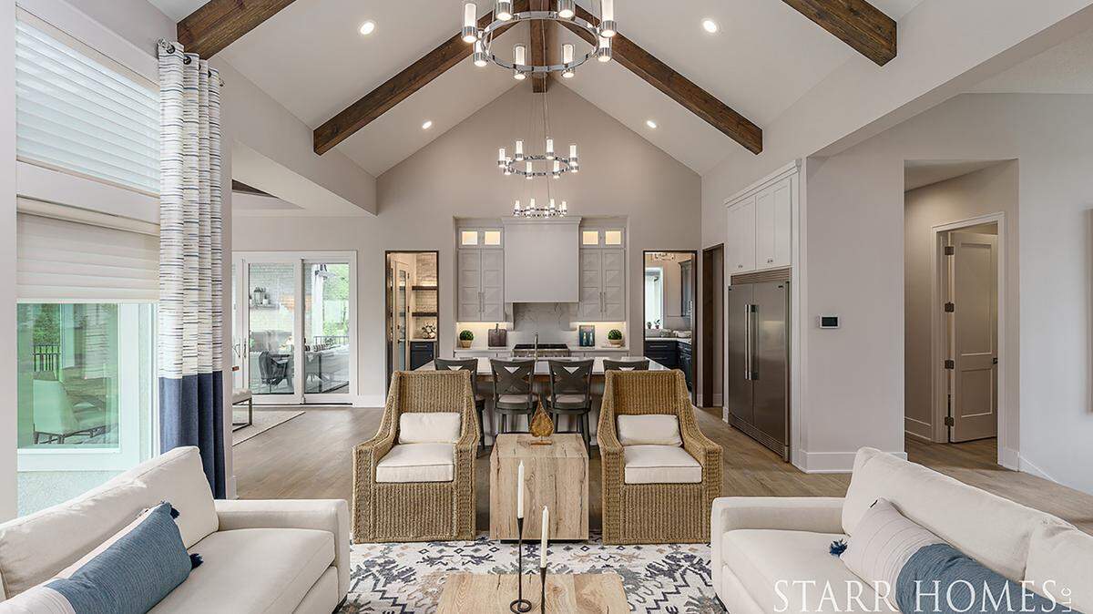 Starr Homes’ Parade of Homes entry #111 includes an inviting hearth room and kitchen.