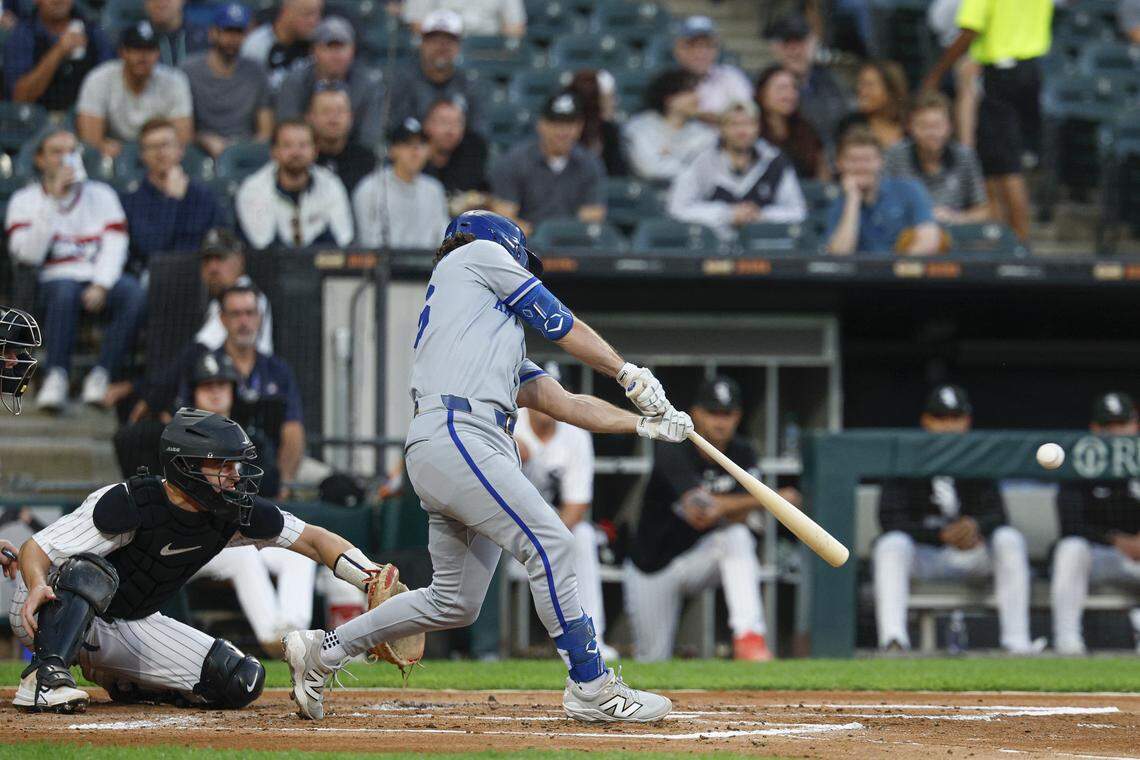 Aug 27, 2025; Chicago, Illinois, USA; Kansas City Royals second baseman Adam Frazier (26) singles against the Chicago White Sox during the second inning at Rate Field. Mandatory Credit: Kamil Krzaczynski-Imagn Images