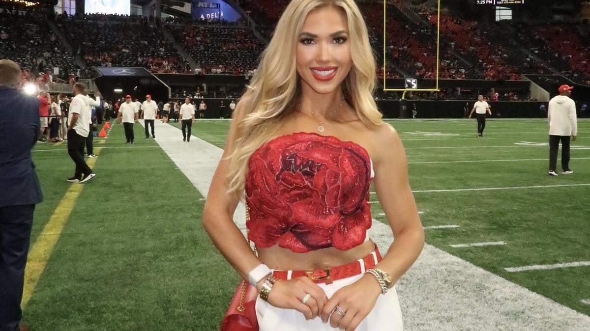 Gracie Hunt represented the Chiefs in a red top shaped like an oversized flower at the Falcons game in Atlanta Sunday.