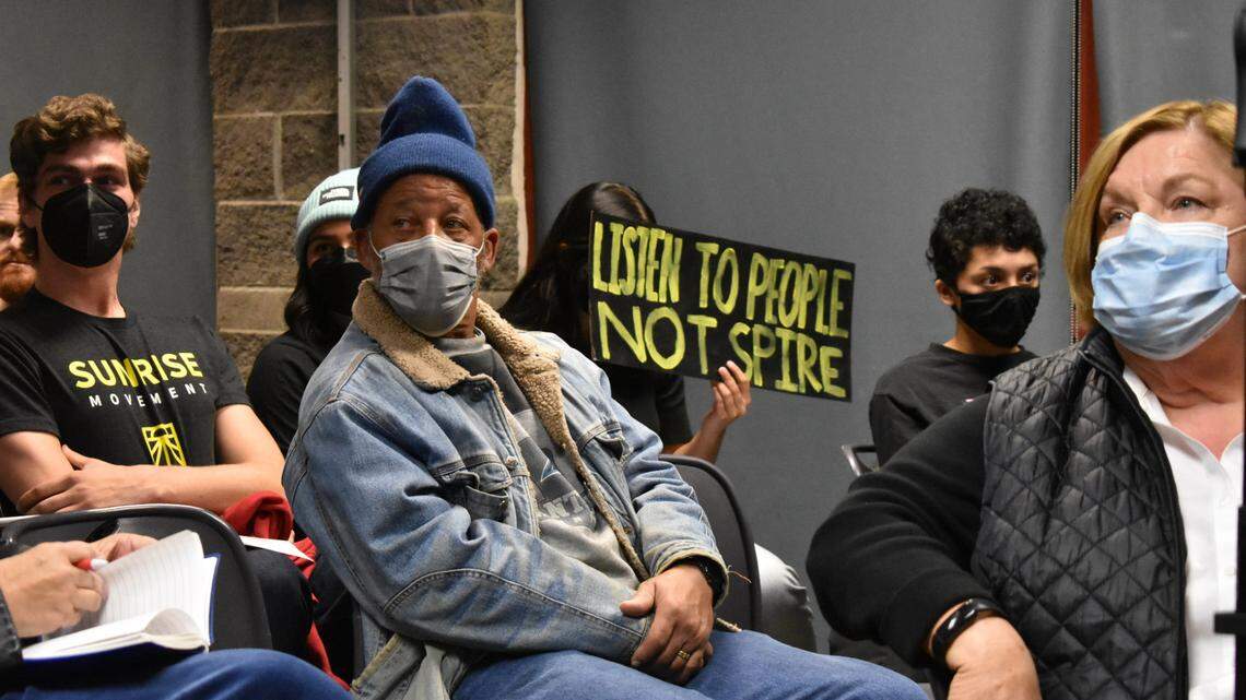 Kansas City residents, including City Councilmember Katheryn Shields (far right) and activists from the youth-led environmental justice group Sunrise Movement, listen to testimony during a public hearing over Spire’s rate increase request on Tuesday, Oct. 18, 2022.