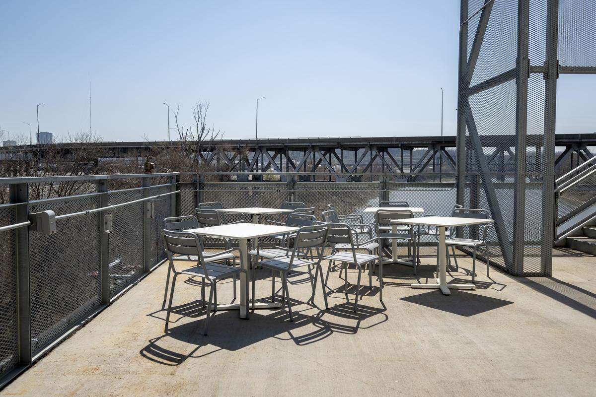 A seating area overlooking the Kansas River is seen from Rock Island Bridge on Wednesday, March 25, 2026, in Kansas City.