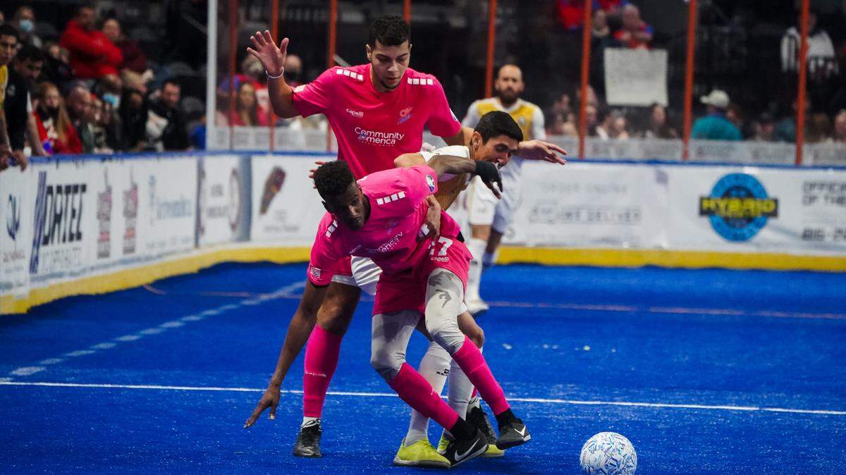 Kansas City Comets players Ali Sodal and Rian Marques battle a Chihuahua Savage opponent for ball last Saturday at Cable Dahmer Arena in Independence.